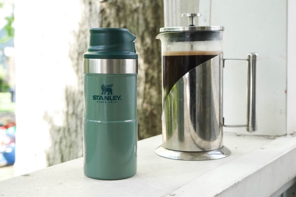 1fbc27a1-stanley-classic-trigger-action-travel-mug-12-oz-with-coffee.jpg