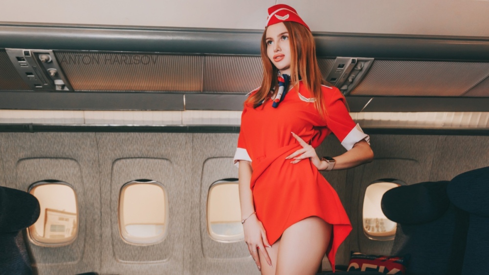 women_model_brunette_portrait_airplane_stewardess_dress_red_dress-1541707.jpg